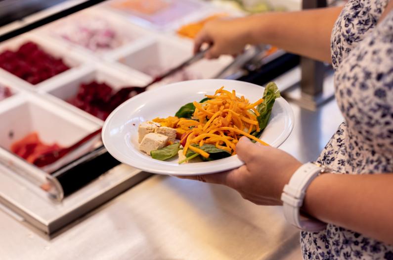 Salad bar with lots of healthy options.